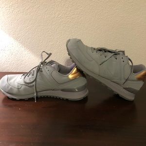 574 gray and gold NB